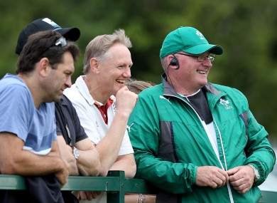 Les Kiss (black cap), Joe Schmidt and Philip Doyle watch Ireland versus Wales at Malahide RFC.