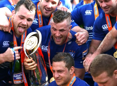 Leinster players pose with the Pro12 trophy at the end of last season.