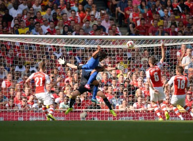 AS Monaca FC's Radamel Falcao heads home the opening goal of the game.