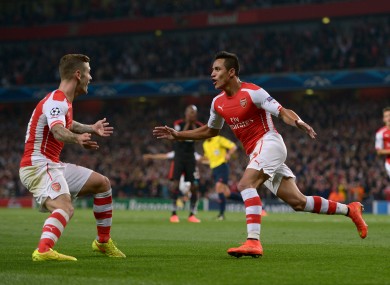 Sanchez celebrates his goal last night.