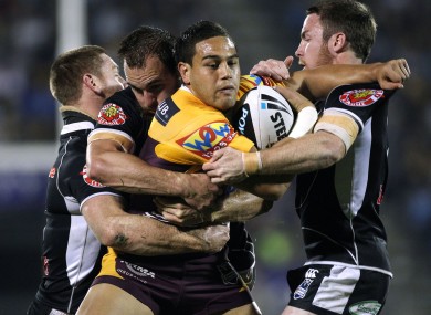 Te'o makes a powerful carry for the Brisbane Broncos in 2010.
