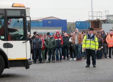 Gardai redirect Greyhound trucks blocked by supporters of the striking workers.