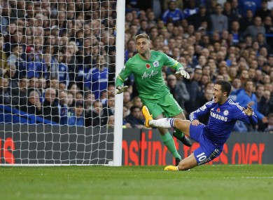 Hazard won and scored the winning penalty for The Blues.