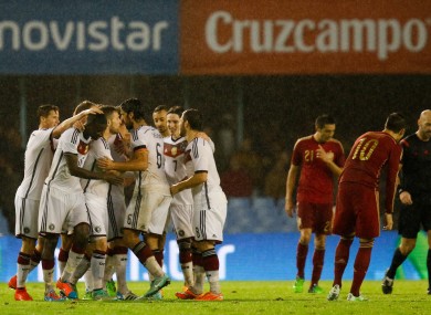 Germany's Toni Kroos celebrates scoring his side's first goal of the game with teammates.