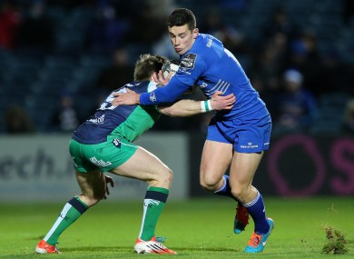 Reid beats the tackle of Marmion at the RDS last night.