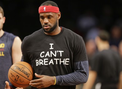Lebron James warms up wearing an 'I Can't Breathe' t-shirt. The shirts protest a grand jury decision not to indict an NYPD officer in the death of Eric Garner.