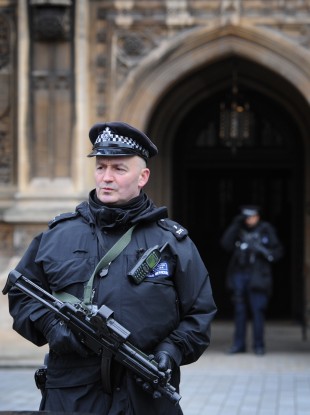 Armed police officers outside the Houses of Parliament in London.