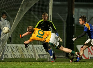 Meath's Sean Tobin scores a goal past Longford goalkeeper Paddy Collum.
