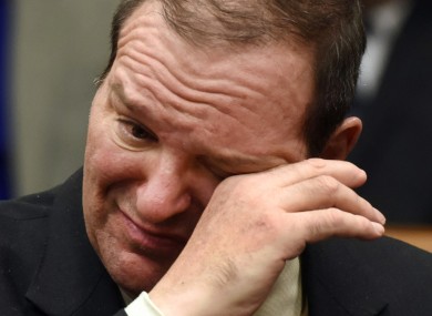 Bob Bashara wipes his eyes after hearing his mother-in-law Lorraine Engelbrecht speak at his sentencing hearing.