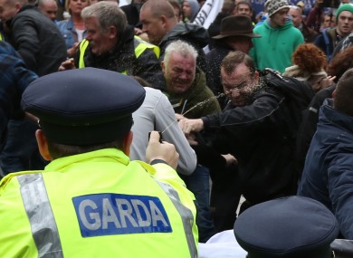 Garda using pepper spray on anti-austerity protesters outside the Dáil in 2013.