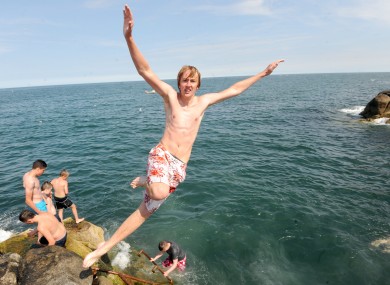Luke Halligan (17 from Dublin) jumps in at the Forty Foot at Sandyove in 2012.