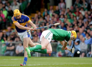 Limerick's Seamus Hickey blocks the goal bound shot from Tipperary's Seamus Callanan.