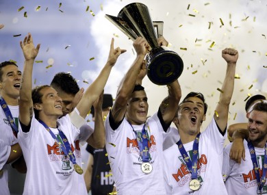 Mexican players celebrate their win.