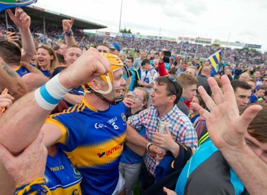 Pádraic Maher celebrates with Tipp fans yesterday.
