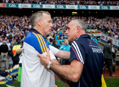 O'Shea, left, was consoled by Anthony Cunningham after Sunday's one-point loss.