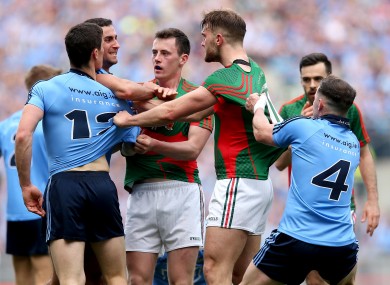 Dublin and Mayo players clash during last week's game.
