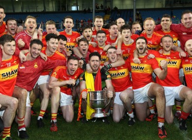 Castlebar Mitchels players celebrate with the cup.