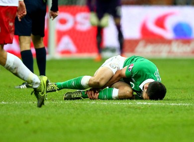 Long goes down holding his ankle in Warsaw.