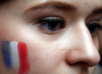 A French woman at a vigil for Friday night's victims.