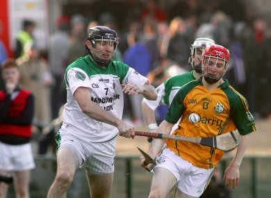 Thomas Monaghan of Craughwell with Eamon Cleary of Sarsfields.