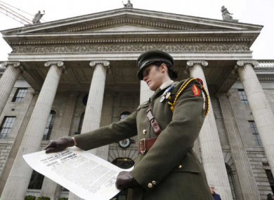 Irish Army Captain Kate Hanrahan with the Irish Republic proclamation at the official commemoration of the 1916 Easter Rising Commemoration Ceremony at the GPO on O'Connell Street, Dublin earlier this year.
