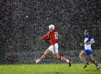 Cork's Patrick Cronin gets a shot away against Waterford.