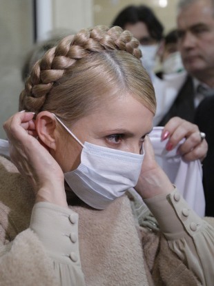 The then Ukrainian prime minister Yulia Tymoshenko in 2010 wearing a mask to protect against Swine flu