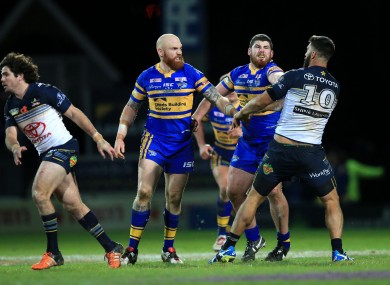 Garbutt (second right) shapes up for the punch.