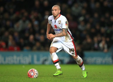 Carruthers plays for League One side MK Dons.
