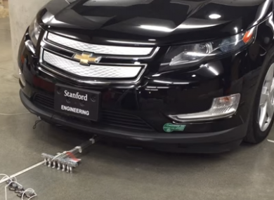 That's not some weird rake underneath the car. That's a team of micobots pulling it.