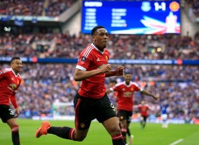 Martial celebrates his winner.