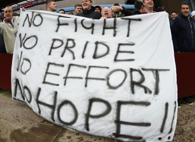 Aston Villa fans show their discontent as relegation draws closer.
