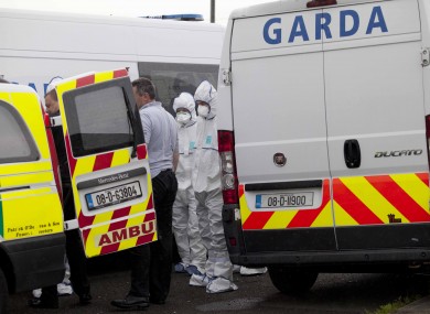 The man's body is removed from the scene this afternoon.