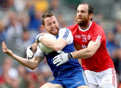 Owen Duffy struggles against Justin McMahon of Tyrone last year.