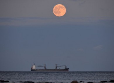 The full moon, known as the strawberry moon, rises near Whitley Bay in England earlier this month.