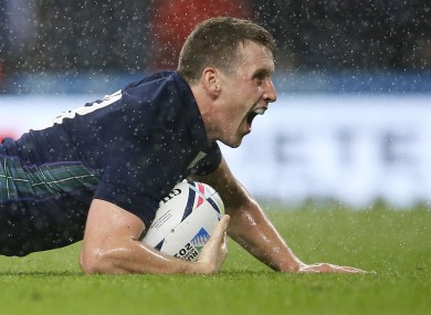 Scotland's Mark Bennett celebrates scoring a try against Australia in the quarter-final of the Rugby World Cup against Australia.