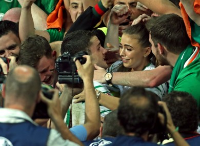 Republic of Ireland's Robbie Brady (centre) celebrates after the final whistle of their Euro 2016, Group E match against Italy at the Stade Pierre Mauroy, Lille.