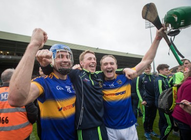 John, Brian and Noel McGrath celebrate a great day for Tipperary hurling.