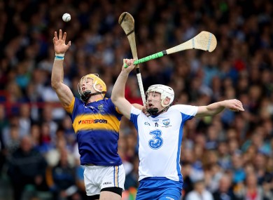 Waterford's Shane Bennett in action against Padraic Maher on Sunday.