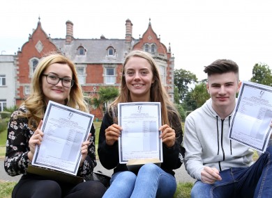 Spring Mitchell, Paula Grina and Ian Bethel in Mount Temple Comprehensive School in Dublin with their Leaving Cert results.
