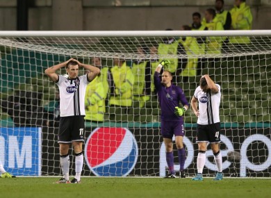 Dejected Dundalk players after Legia's second goal.