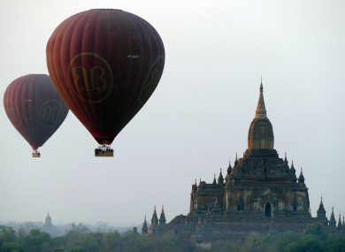 Balloons carrying tourists near old temples in Bagan, Myanmar. A powerful 6.8-magnitude earthquake shook central Myanmar today, damaging scores of ancient Buddhist pagodas in the former capital of Bagan.