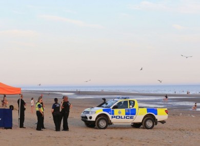 Police at the beach yesterday