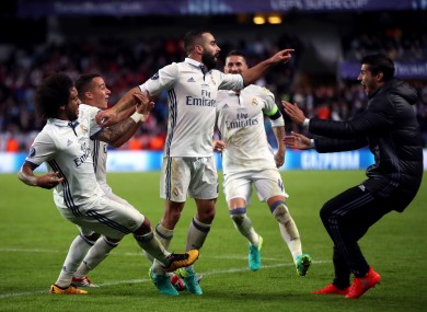 Match-winner Carvajal celebrates with Real Madrid team-mates.