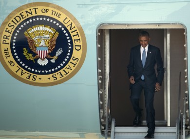 Obama departs Air Force one at Hangzhou airport.
