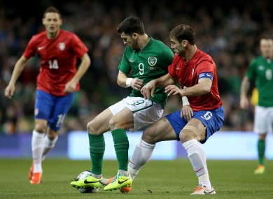 Shane Long shields the ball from Ivanovic when the teams met in 2014.