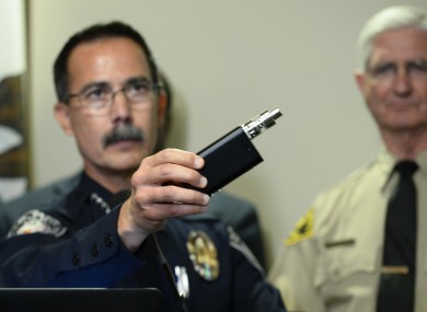 El Cajon Police Department Captain Jeffery Davis holds up a vape device similar to the one that they claim that Alfred Olango was holding when he was shot.