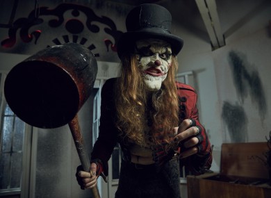 Charlie Chopper, the ringleader of The Nightmare Realm performance group.