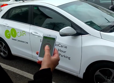 Users can use an app to book a car. (File photo)