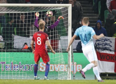 Joe Hart makes a save for England.